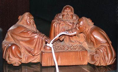Lot 307 - Sectional Wood Carving of Three Sages Playing Go