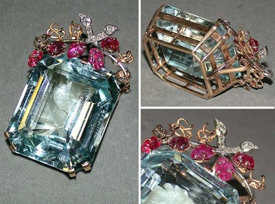 Lot 416A - Blue Topaz, Ruby and Diamond Pendant The...