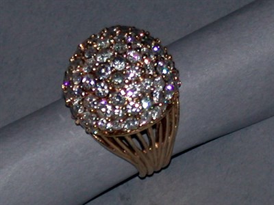 Lot 155 - Diamond Ring The 14 kt. yellow gold mounting...