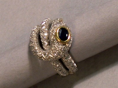 Lot 125 - Sapphire and Diamond Snake Ring 18 kt. yellow...