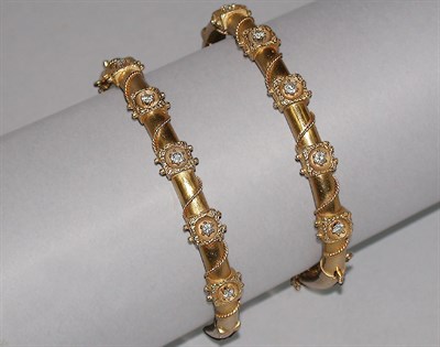 Lot 127 - Two Gold and Diamond Bangle Bracelets