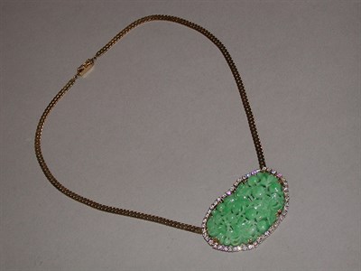 Lot 180 - Carved Jade Pendant and Chain