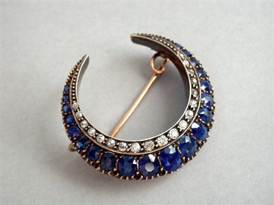 Lot 149 - Diamond and Sapphire Crescent Pin