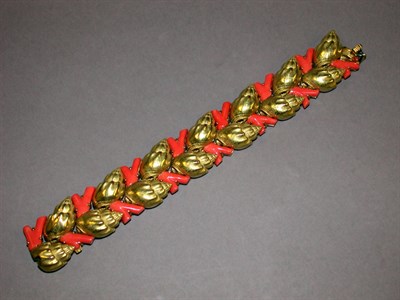 Lot 211 - Gold and Coral Seashell Link Bracelet