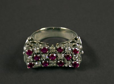 Lot 106 - Ruby and diamond checkerboard ring, 14 kt....