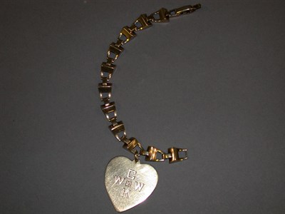 Lot 51 - Gold Link Bracelet with Heart Charm