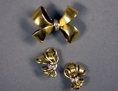 Lot 90 - Gold and Diamond Bow Pin and Earclips Set