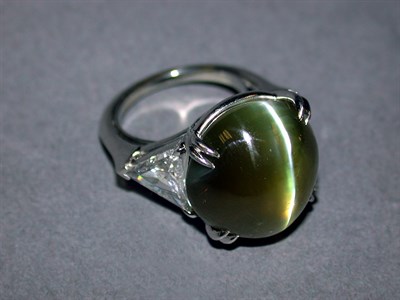 Lot 296 - Large Cat's Eye and Diamond Ring