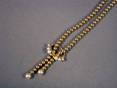 Lot 341 - Gold and Cultured Pearl Lavaliere 14 kt....