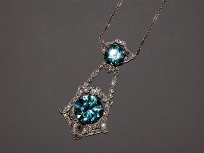 Lot 359 - Art Deco Diamond and Blue Zircon Pendant...
