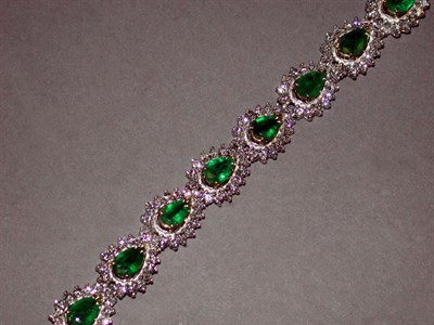 Lot 259 - Diamond and Emerald Bracelet