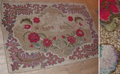 Lot 313 - Hooked Rug With a foliate border centering...