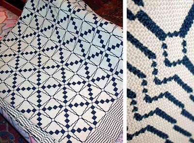 Lot 79 - Blue and White Wool Coverlet In a geometric...