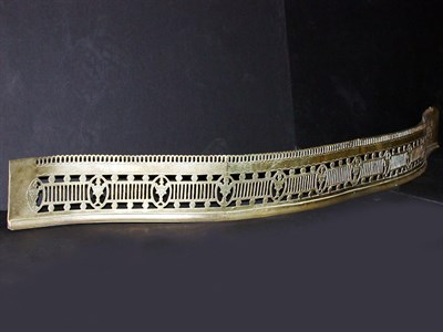 Lot 179 - Brass Fire Fender Of serpentine form, pierced...