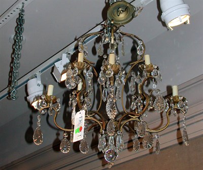 Lot 388 - Louis XV Style Patinated-Metal and Glass Eight-...