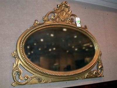Lot 132 - Rococo Style Gilt-Wood Mirror Of oval form,...