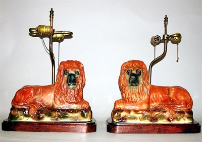 Lot 133 - Pair of Staffordshire Pottery Lions Each in a...