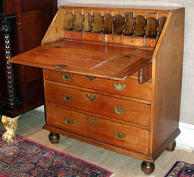 Lot 180 - Chippendale Maple Slant-Front Desk The top...