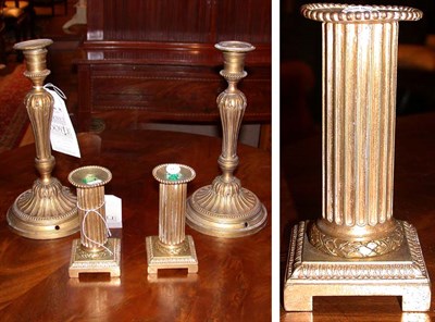 Lot 596 - Two Pairs of Brass Candlesticks