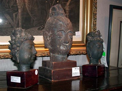 Lot 597 - Group of Three Asian Heads