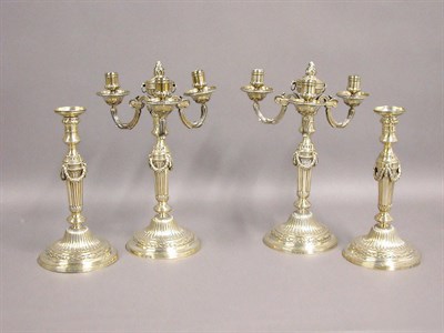 Lot 277 - Set of Four Modern English Silver Candlesticks...
