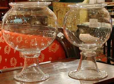 Lot 125 - Pair of Glass Fish Bowls Height 14 inches.