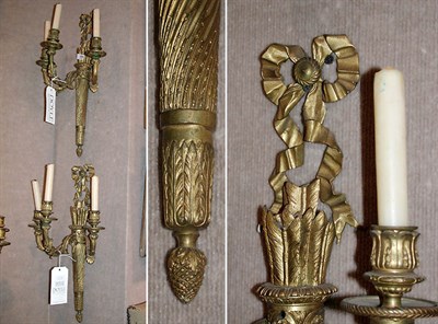 Lot 576 - Pair of Louis XVI Style Bronze Three-Light...