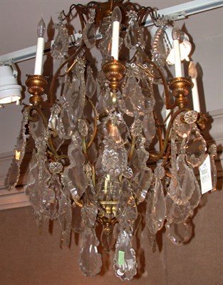 Lot 320 - Louis XV Style Gilt-Bronze and Cut Glass Eight-...