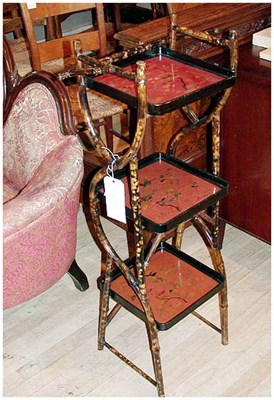 Lot 193 - Bamboo and Lacquered Three-Tier Stand