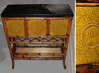 Lot 321 - Victorian Bamboo Jardiniere With a leather top...