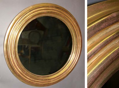 Lot 995 - Pair of Gilt Circular Mirrors Designed by...