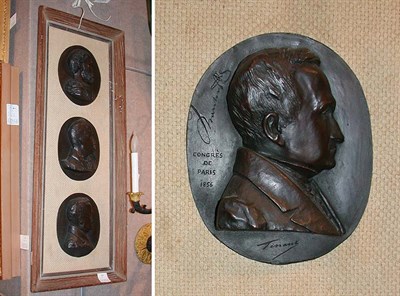 Lot 365 - Two Sets of Three Bronze Relief Portraits...