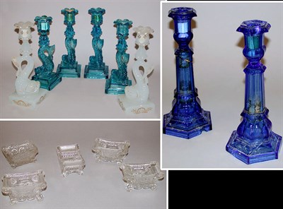 Lot 3487A - Set of Four Turquoise Glass Dolphin-Form...
