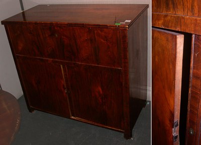 Lot 135 - Biedermeier Walnut Cabinet With a hinged top.