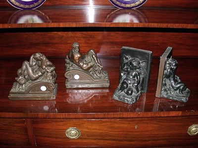 Lot 387 - Group of Three Pairs of Patinated-Metal Bookends