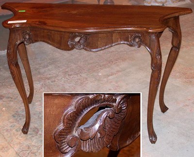 Lot 241 - Pair of Italian Rococo Style Walnut Consoles
