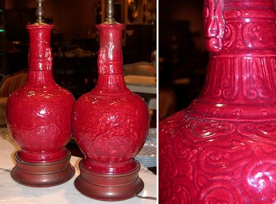 Lot 253 - Pair of Chinese Sang de Boeuf Porcelain Lamps