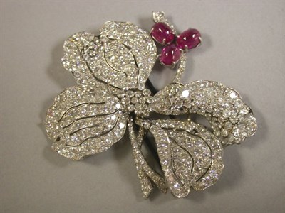 Lot 407 - Diamond and Ruby Flower Pin