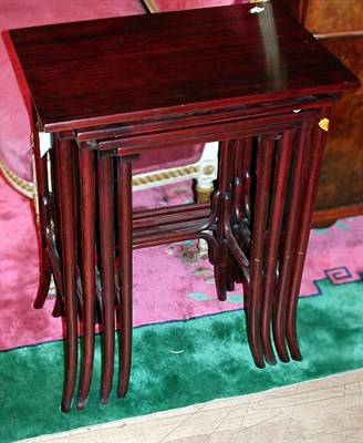 Lot 453 - Nest of Four Faux Painted Rosewood Side Tables