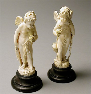 Lot 174 - Pair of Continental Ivory Figures of Cherubs...