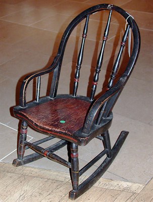 Lot 301 - Black Painted Child's Rocking Armchair The...