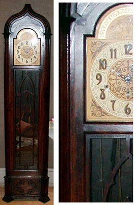 Lot 378 - Gothic Revival Oak Tall Case Clock