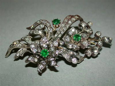 Lot 380 - Antique Style Diamond and Emerald Flower Brooch