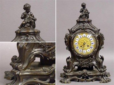 Lot 455 - Louis XV Style Bronze Mantel Clock The top...