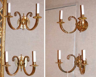 Lot 333 - Set of Four French Style Brass Two-Light Sconces