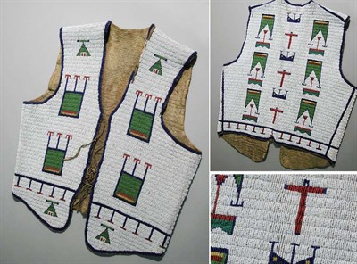 Lot 58 - Sioux Beaded Hide Vest With allover white...