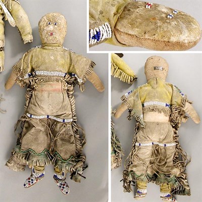 Lot 49 - Plains Hide Female Stuffed Doll With beaded...