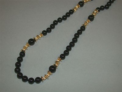 Lot 37 - Black Onyx and Gold Bead Necklace