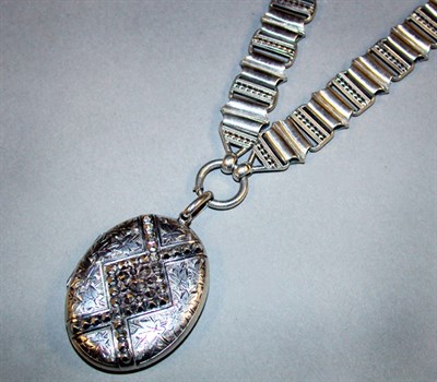 Lot 21 - Victorian Locket and Chain