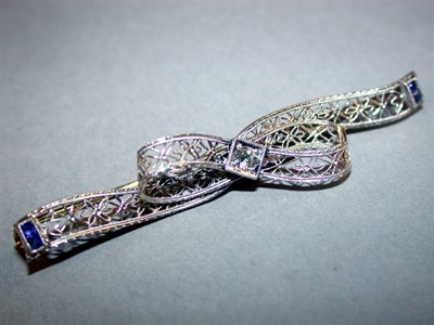 Lot 89 - Diamond Filigree Bow Pin 14 kt. yellow and...
